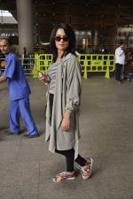 Surveen Chawla returns from Canada in Mumbai Airport on 4th July 2014